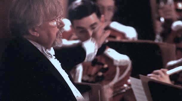 Warren Benson conducting wind ensemble